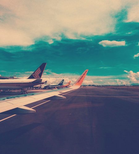 plane-on-airport-under-cloudy-sky-at-daytime-731218